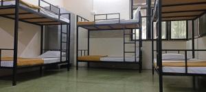 Postel nebo postele na pokoji v ubytování Kritika Accoommdates P G