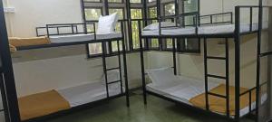 Postel nebo postele na pokoji v ubytování Kritika Accoommdates P G