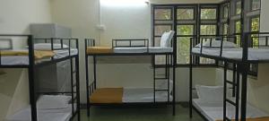 Postel nebo postele na pokoji v ubytování Kritika Accoommdates P G