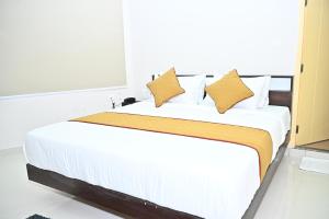 Postel nebo postele na pokoji v ubytování HOTEL SLN COMFORTS