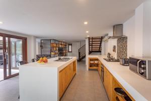 Eldhús eða eldhúskrókur á Coco Lilly Villas
