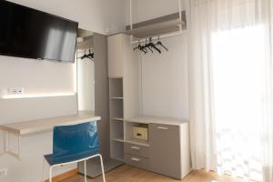 TV a/nebo společenská místnost v ubytování Hotel Arizona