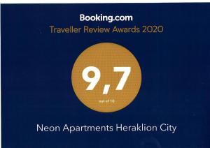 a sign that reads newer apartments hellington city at NEON Apartment, modern, high quality, central Apt, Heraklion City in Heraklio