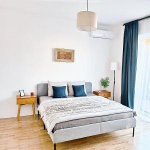 Postel nebo postele na pokoji v ubytování GuestHouse Maison Comfort