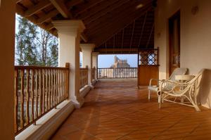 Balkón nebo terasa v ubytování Neemrana's - Bungalow on The Beach
