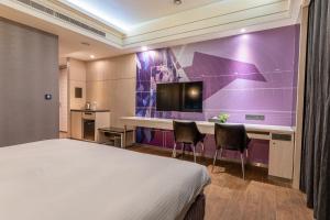 Sjónvarps- og/eða afþreyingartæki á Guide Hotel Taichung Ziyou
