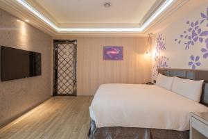 Sjónvarps- og/eða afþreyingartæki á Guide Hotel Taichung Ziyou