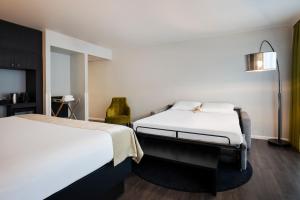 Postel nebo postele na pokoji v ubytování Thon Hotel Bristol Stephanie