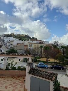 a view of a city with buildings and a street at Casa Rural Aguilar in Aguilar de la Frontera +13 photos
