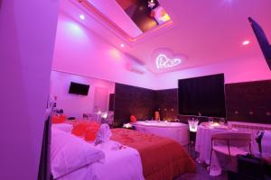 TV a/nebo společenská místnost v ubytování B&B GRECALE Suite & Spa