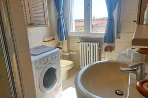 Koupelna v ubytování A casa di nonna Marisa + 3 fotografie