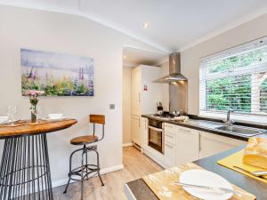a kitchen with a sink and a counter top at 1 Bed in Coniston Water 50081 in High Nibthwaite