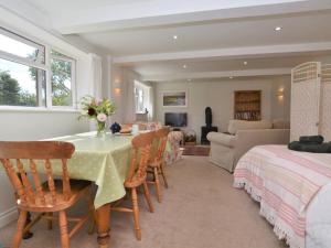 a dining room with a table and chairs at 2 Bed in Beaminster 63136 in Stoke Abbott