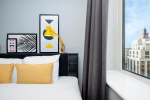 a bedroom with a bed and a window at Staycity Aparthotels Liverpool Waterfront in Liverpool