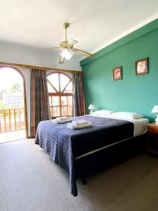 En eller flere senge i et værelse på Hotel Portofino by CPH