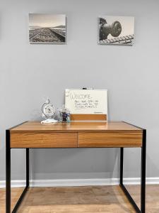 a wooden desk with a box on top of it at Family Home Close To All Perth Adventures in Hamilton Hill