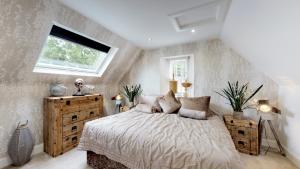 Ένα ή περισσότερα κρεβάτια σε δωμάτιο στο Cameron North Lodge