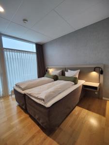 Postel nebo postele na pokoji v ubytování Storebælt Sinatur Hotel & Konference