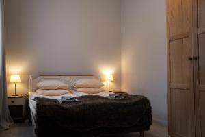 Postel nebo postele na pokoji v ubytování Bed & Breakfast Willa Armas