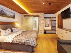 Postel nebo postele na pokoji v ubytování Wildbach Apartments STUBAI - NEW APARTMENTS