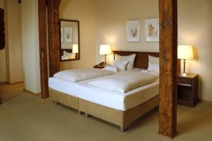 Voodi või voodid majutusasutuse Bergström Hotel Lüneburg toas