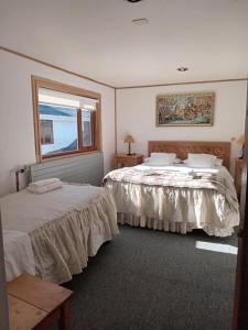 Rúm í herbergi á Hotel Mi Casa