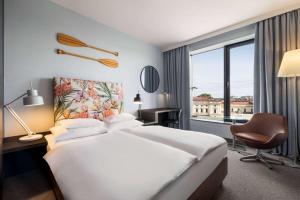 Posteľ alebo postele v izbe v ubytovaní Vienna House by Wyndham Andel's Cracow