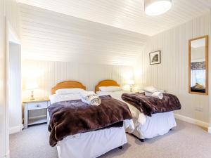 Tempat tidur dalam kamar di 3 Bed in Glencoe 80624