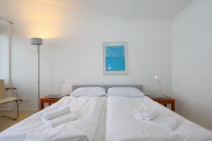 Ein Bett oder Betten in einem Zimmer der Unterkunft Haus am Meer14 - App. 159