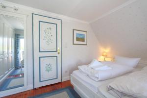 Ένα ή περισσότερα κρεβάτια σε δωμάτιο στο Haus Krauthahn DG