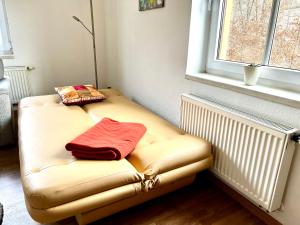 Ένα ή περισσότερα κρεβάτια σε δωμάτιο στο Göltzschtal Apartment +5 φωτογραφίες