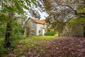 Zahrada ubytování Emji - Maison proche de la plage