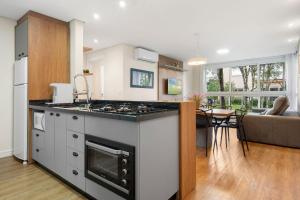 Kuchyň nebo kuchyňský kout v ubytování Toscano Cabernet 2 dorm by Achei Gramado