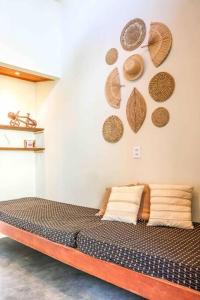 Cama ou camas em um quarto em CHALÉ “Villa La Ribera” Praia da Pipa