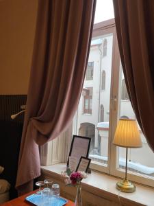Posezení v ubytování Lilla Hotellet