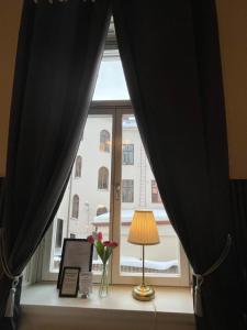 Posezení v ubytování Lilla Hotellet
