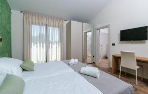 Posteľ alebo postele v izbe v ubytovaní Villa Frida in Vizinada, Poreč by Istrabook