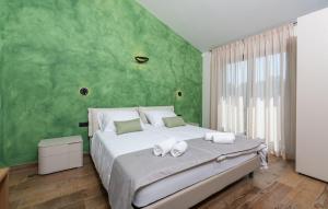 Posteľ alebo postele v izbe v ubytovaní Villa Frida in Vizinada, Poreč by Istrabook
