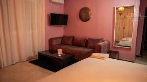 TV a/nebo společenská místnost v ubytování Aparthotel & Hotel Doha
