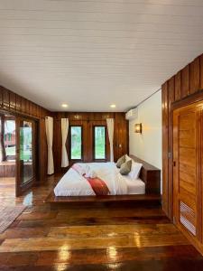 Postel nebo postele na pokoji v ubytování COCO Canopy Boutique Resort