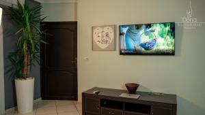 TV a/nebo společenská místnost v ubytování Aparthotel & Hotel Doha