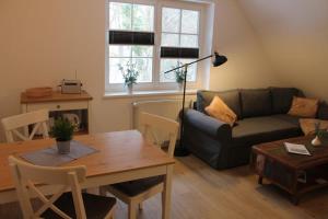 Posezení v ubytování Ferienwohnung Lasse in Wieck