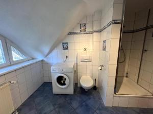 Koupelna v ubytování Ferienwohnung Lasse in Wieck
