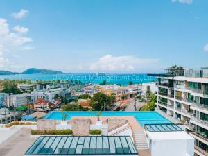 Bazén v ubytování The Unity and The Bliss Patong Residence nebo v jeho okolí