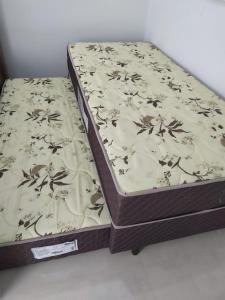 a mattress sitting on a floor in a room at SEU LAR in Machadinho