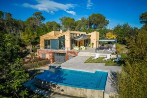 an aerial view of a house with a swimming pool at Villa Laiar in Sencelles