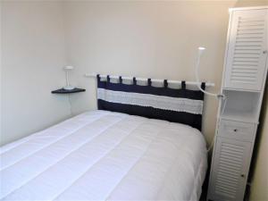 Posteľ alebo postele v izbe v ubytovaní Appartement 2 à 4 personnes à 100 m de la mer - Gwendal