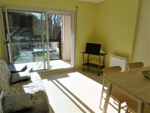 Posedenie v ubytovaní Appartement 2 à 4 personnes à 100 m de la mer - Gwendal