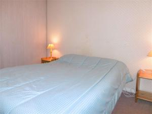 Posteľ alebo postele v izbe v ubytovaní Appartement 2 à 4 personnes à 50 m du port de St Jacques - Kolen
