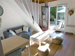 Posedenie v ubytovaní Maisonnette 3 pièces 4 personnes à 200 m de la plage - wifi - LOMAN